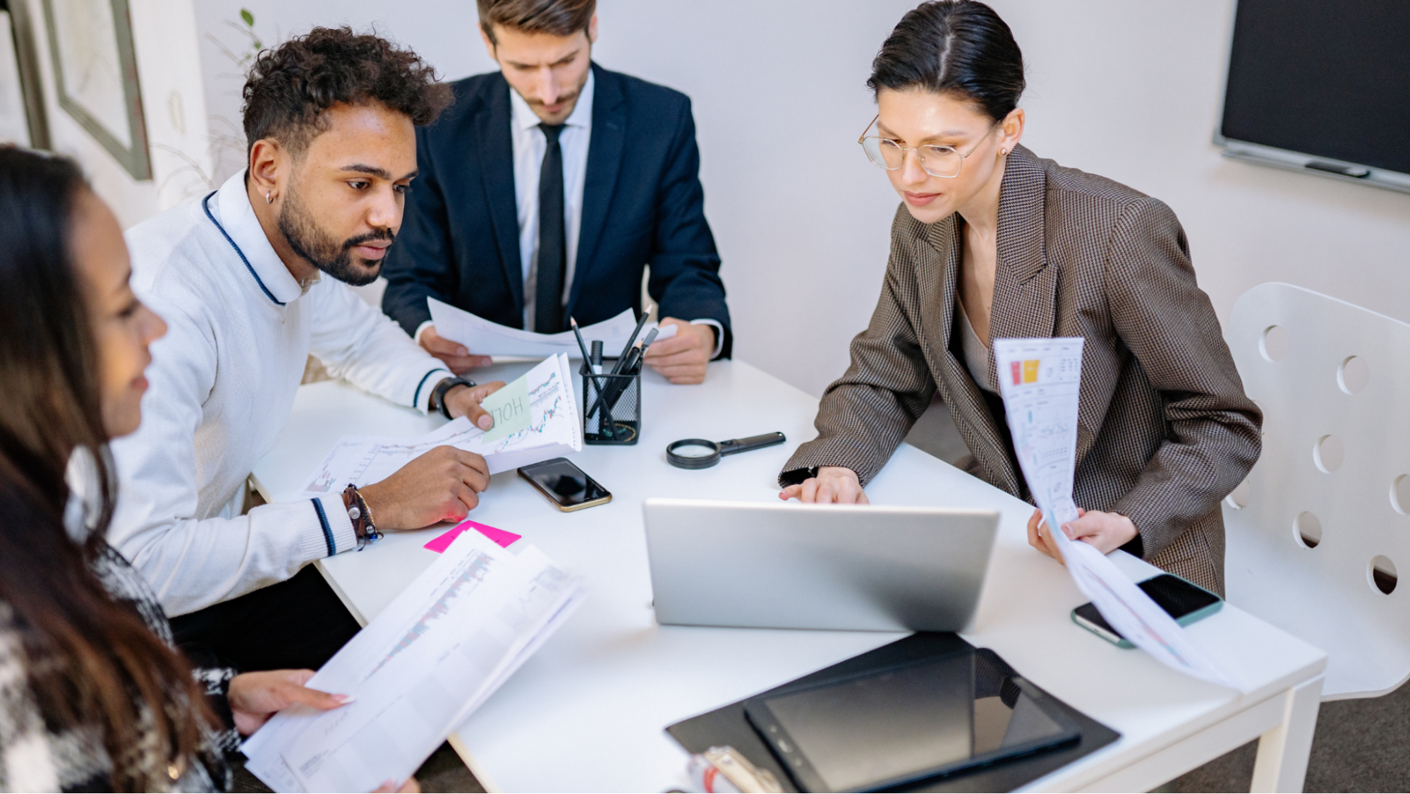 image3 Business team reviewing year-end payroll reports – AllStaff Payroll Services year-end payroll checklist